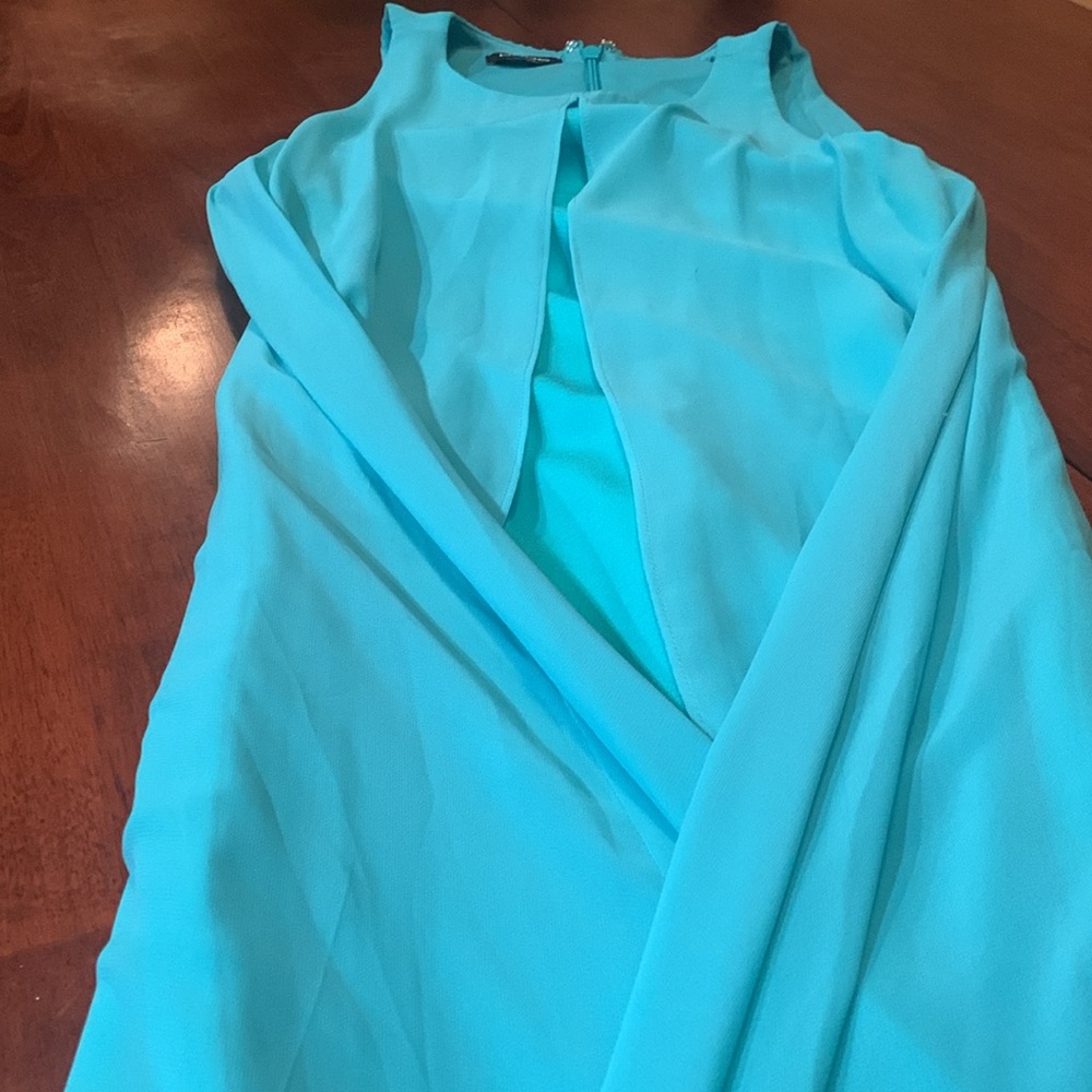 Absolutely stunning double fashionable Bebe Turquoise Zip-Back Top dress, size M
